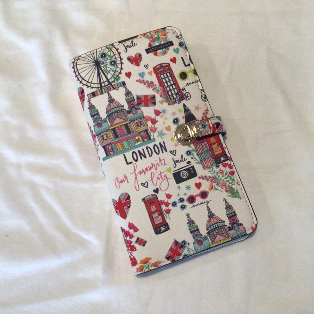 Passport wallet, purse, lots of pocket for bills, change and photo ID/Passport